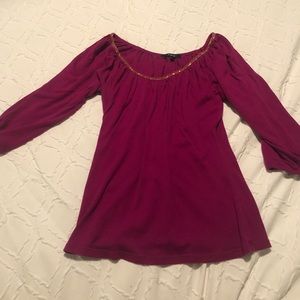 Express Plum color shirt with gold neck beading